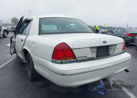 1999 Ford Crown Victoria из США, поврежденный, VIN 2FAFP73W9XX132741